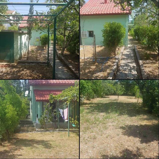 Продается уютный дом с зеленым участком и панорамным видом на море в Будве за