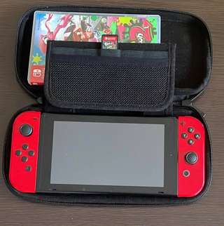Продам Nintendo Switch с красными Joy-Con + игра Splatoon 2