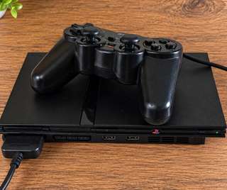 Продам Sony PlayStation 2 Slim